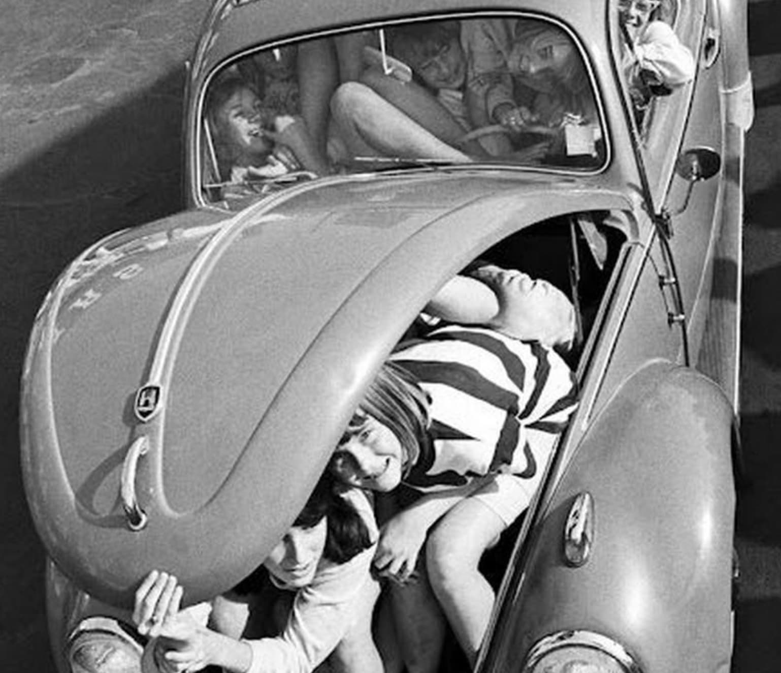 many people in a vw beetle